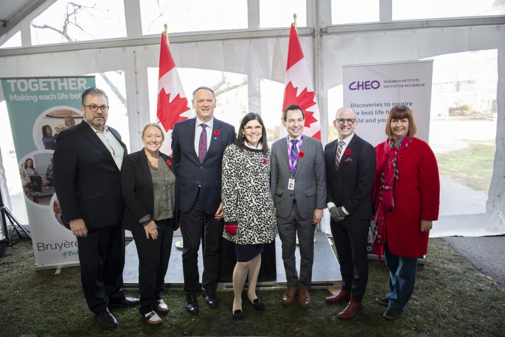Guy Chartrand, MP Mona Fortier, MP David McGuinty, Minister Filomena Tassi, Alex Munter, Jason Berman, and MP Marie-France Lalonde at the FedDev Ontario funding announcement for the 8-80 Collaborative between the CHEO RI and Bruyere.