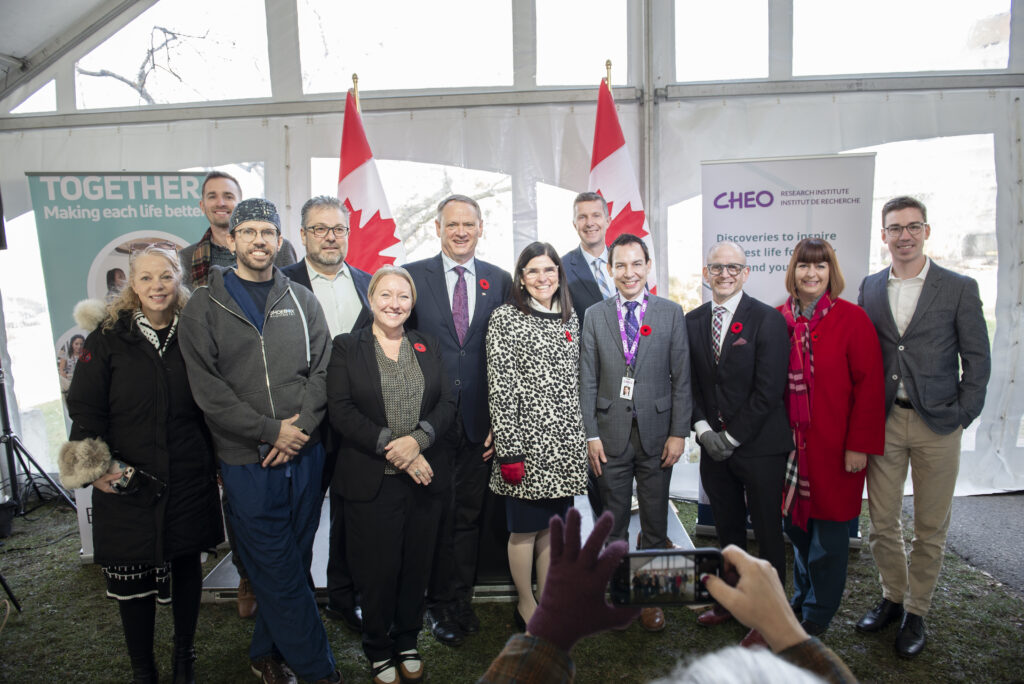 Members of the 8-80 Collaborative with dignitaries at the FedDev Ontario grant announcement at CHEO.